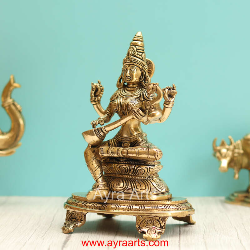 Brass Saraswati Devi Sitting On Chowki - 9 Inch Height