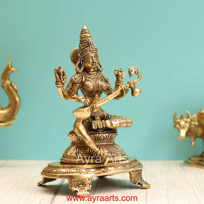 Brass Saraswati Devi Sitting On Chowki - 9 Inch Height