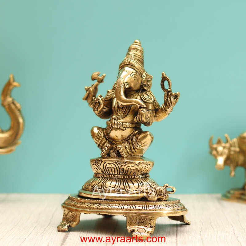 Brass Ganesha Sitting On Chowki - 9 Inch Height