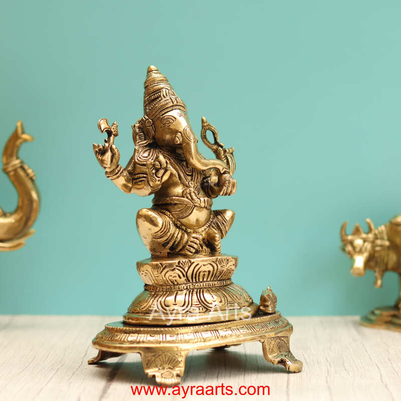 Brass Ganesha Sitting On Chowki - 9 Inch Height