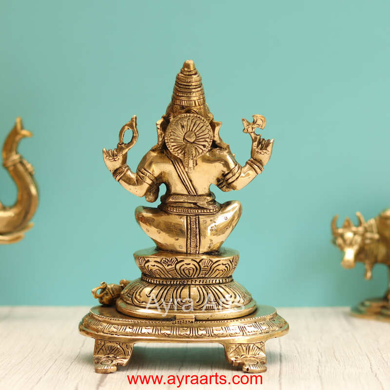 Brass Ganesha Sitting On Chowki - 9 Inch Height