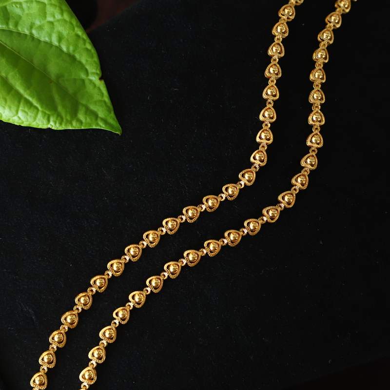 gold with small round design ankelts