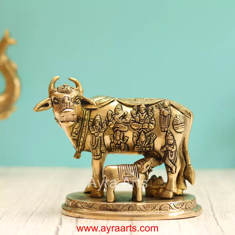 Brass Handcrafted Cow with Calf Engraved with Hindu Deities - 5.25 Inch Height
