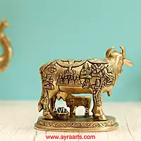Brass Handcrafted Cow with Calf Engraved with Hindu Deities - 5.25 Inch Height
