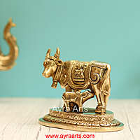 Brass Kamdhenu Holy Cow And Calf with Lakshmi Ganesh Carving - 5 Inch Height
