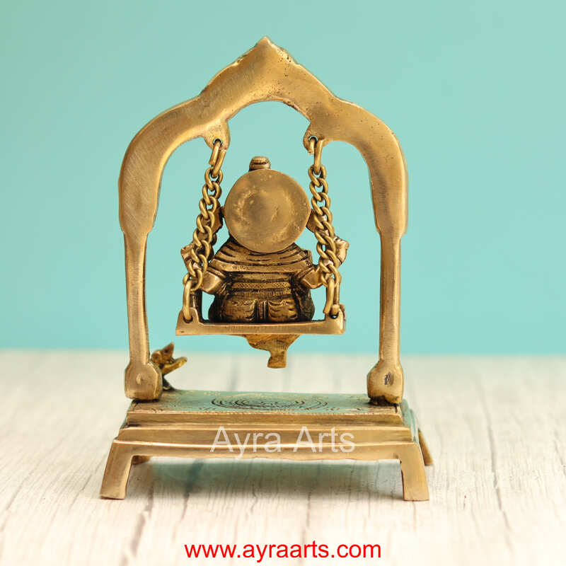 Brass Ganesha Sitting On Swing Jhula - 7.5 Inch Height