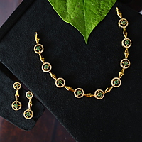 Antic gold finished Peacock design neckpiece with Ruby stone paired with Earings