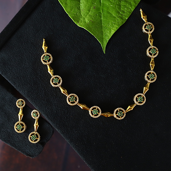 Antic gold finished Peacock design neckpiece with Ruby stone paired with Earings