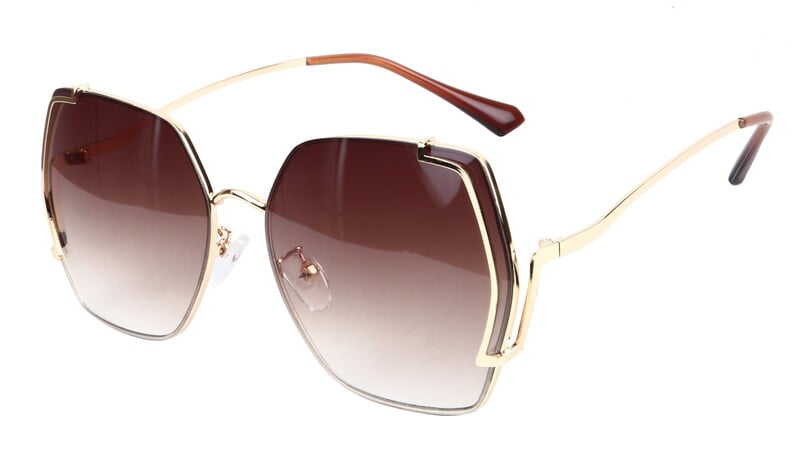 Female Oversized Sunglasses. Golden Frame. Gradient Brown Color Lens. Female Oversized Sunglasses. Golden Frame. Gradient Brown Color Lens.
