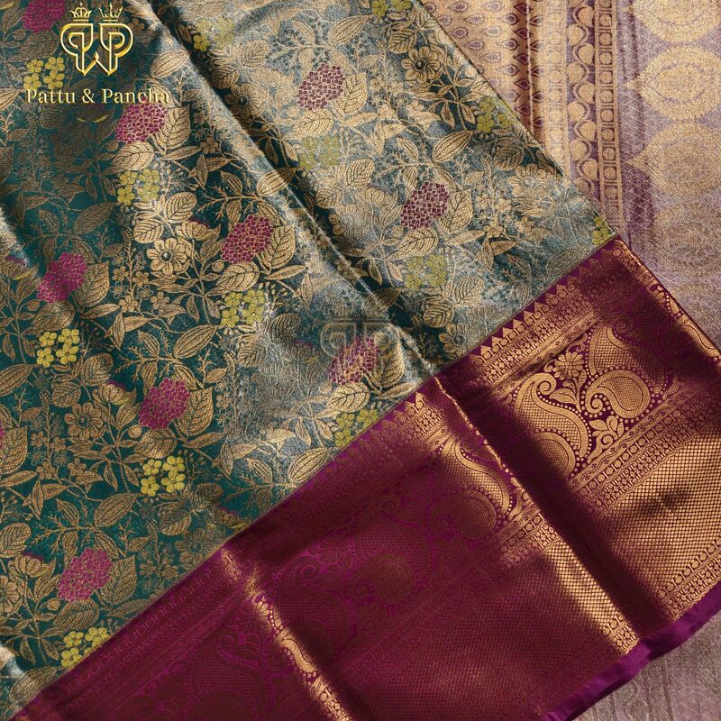 Semi Silk Tissue Aqua Blue Floral Brocade Saree with Purple Zari Border