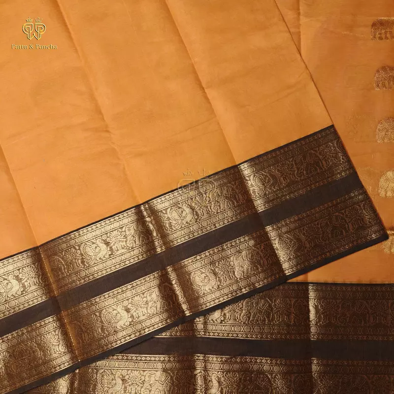 Kanchi Cotton Saree in Orange with Brown Traditional Gold Zari Border