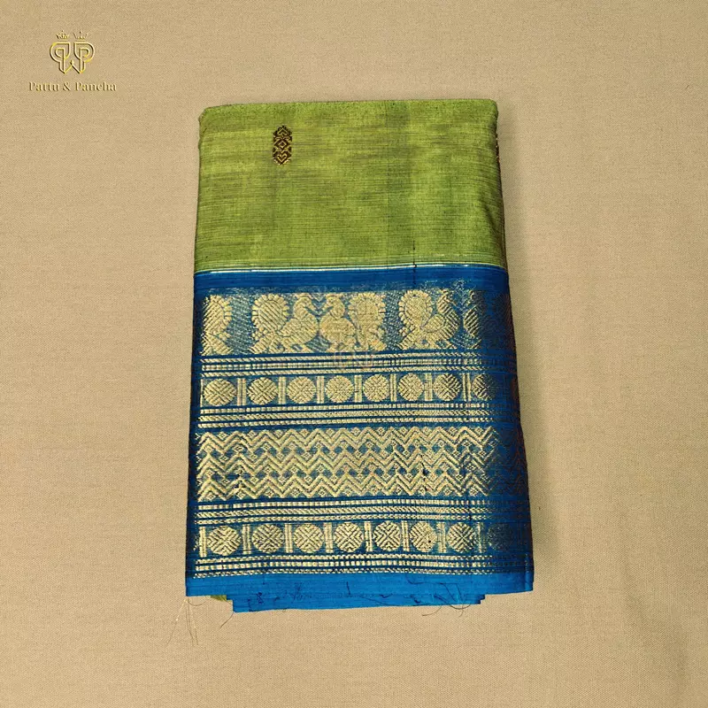 Kanchi Cotton Saree in Leaf Green with Royal Blue and Gold Zari Border