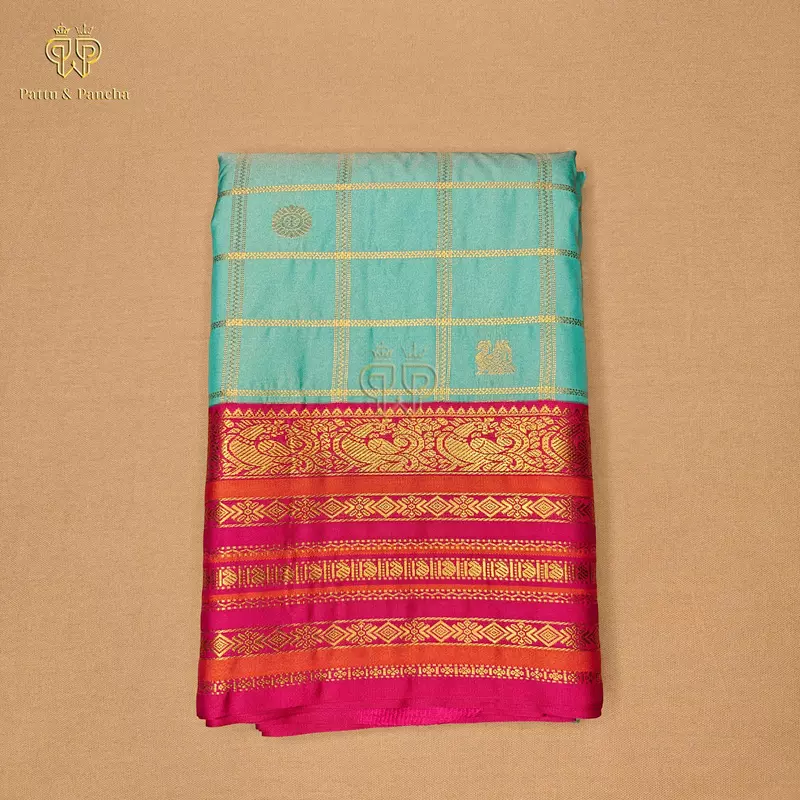 Semi Silk Aqua Blue Checks and Rani Pink Saree with Gold Zari Motifs and Varisaipet Zari Border