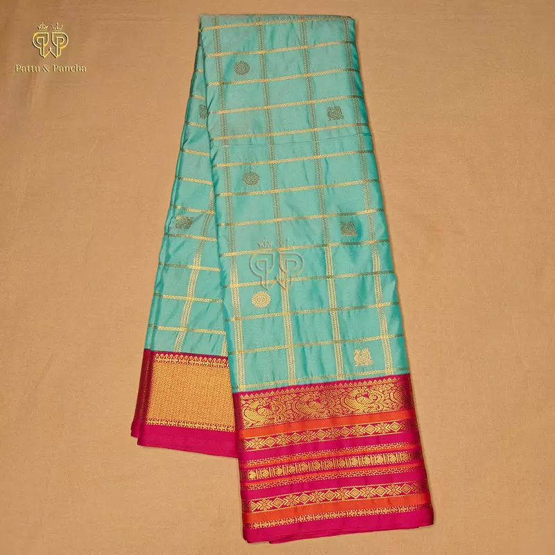 Semi Silk Aqua Blue Checks and Rani Pink Saree with Gold Zari Motifs and Varisaipet Zari Border