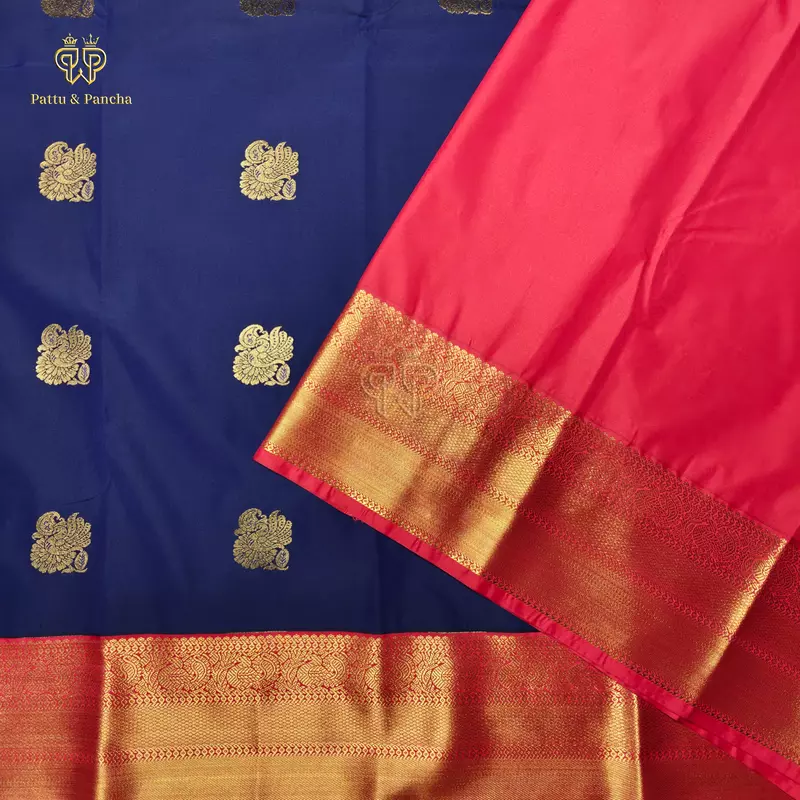 Semi Silk Dark Blue and Orangish Red Saree with Gold Zari Peacock Motifs and Rich Zari Border