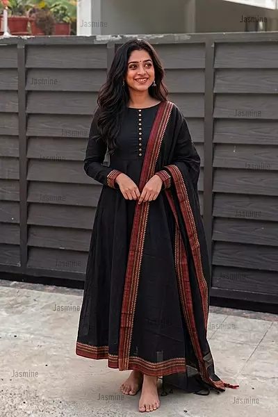 Plain black dress material with a simple red border and matching dupatta