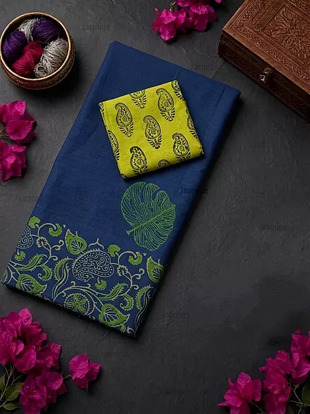 Dark blue saree with green vines, leaves and paisley border detailing