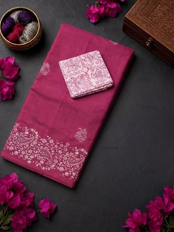 Peach rose cotton saree featuring delicate white prints across the body