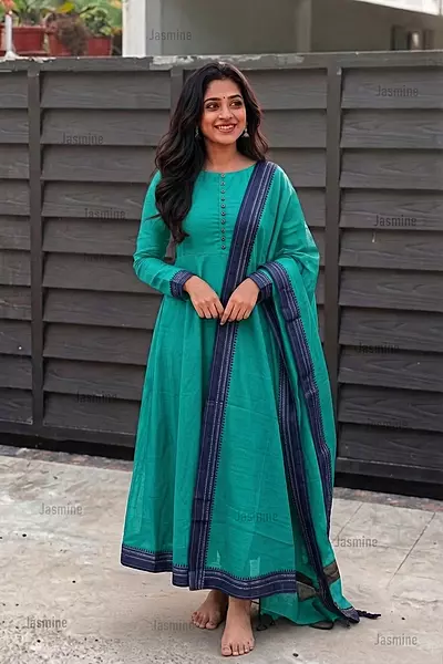 Plain turquoise cotton dress material with a simple blue border and matching dupatta