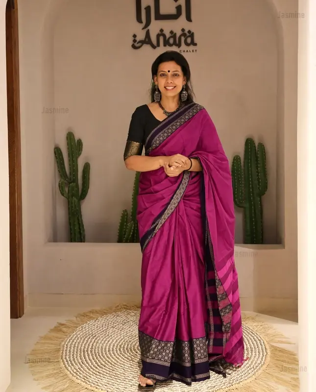 Mercerised cotton Narayanpet saree with a soft shining finish and detailed dark blue floral border