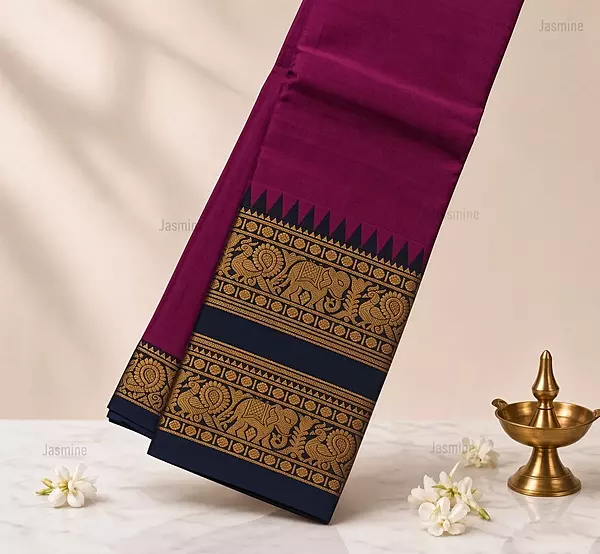 Magenta Narayanpet cotton saree with elephant and peacock motifs