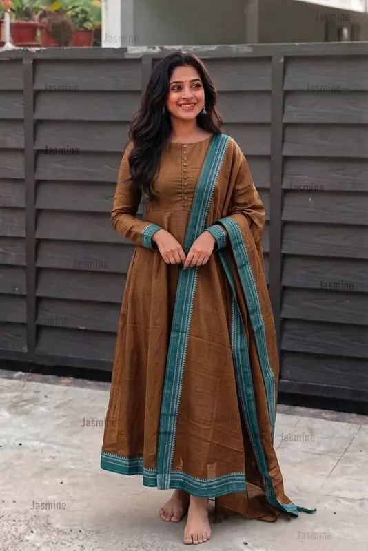 Plain mustard cotton dress material with a simple green border and matching dupatta