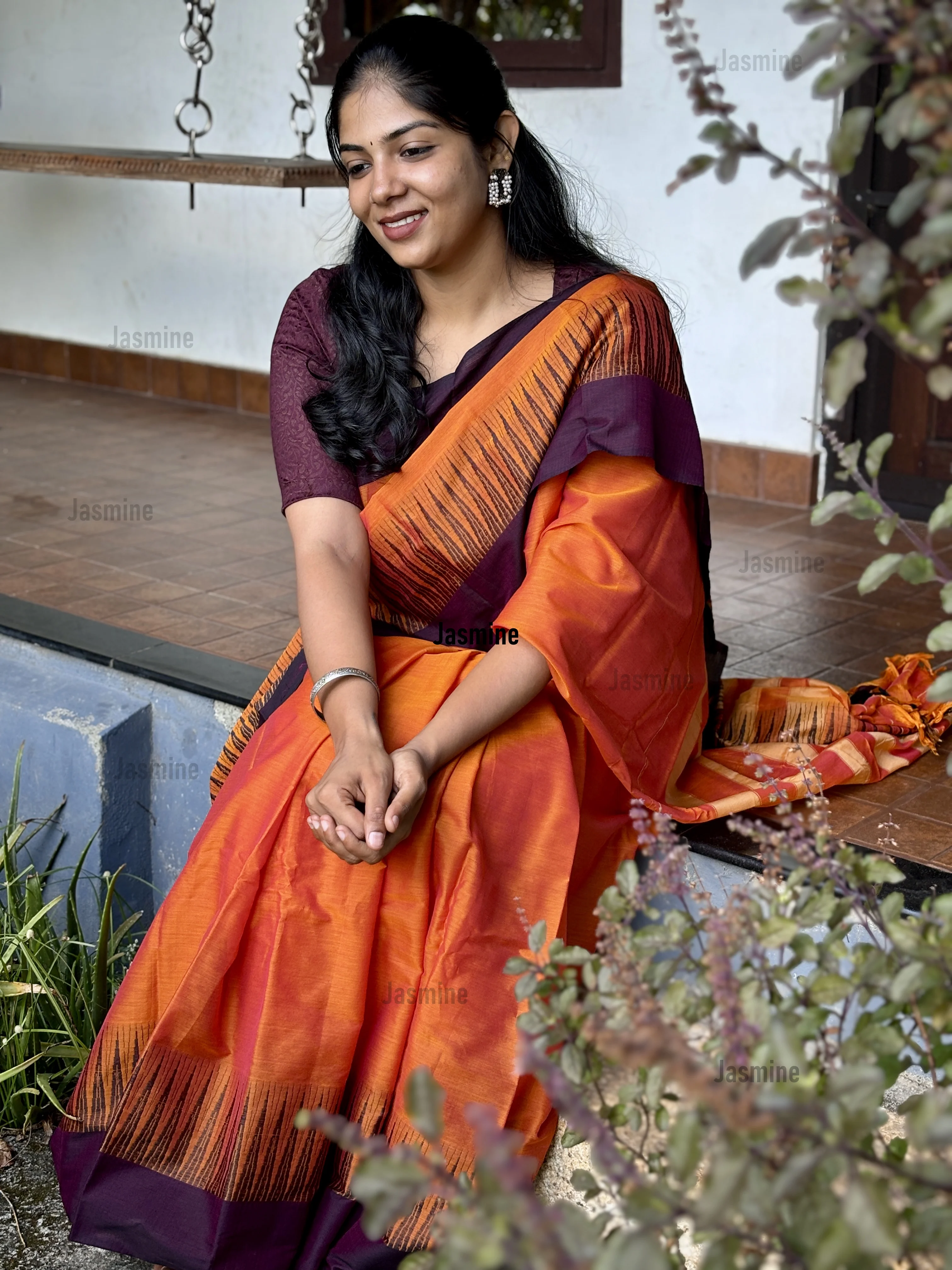 orange Narayanpet cotton saree with Deep Plum Temple border