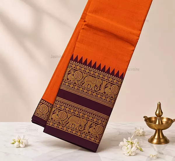 Orange Narayanpet cotton saree with elephant and peacock motifs