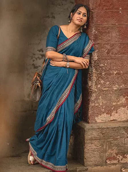 peacock blue Narayanpet cotton saree with plain body and red border