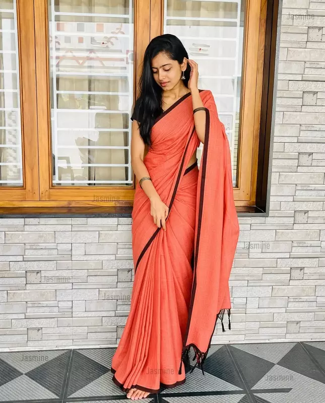 Coral peach Mul Cotton saree with brown border