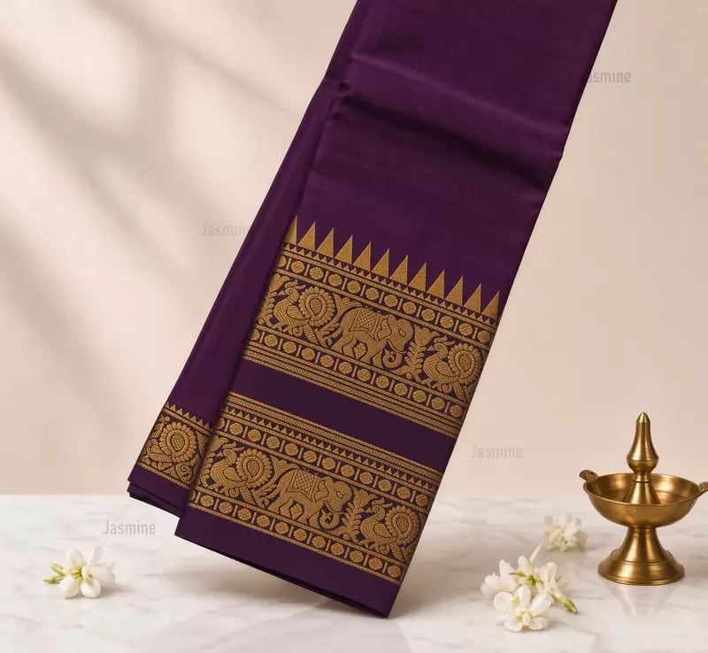 Deep plum Narayanpet cotton saree with elephant and peacock motifs
