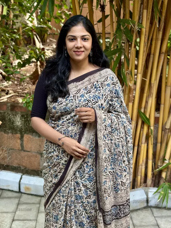 Handmade Kalamkari saree in soft pure cotton with natural dye floral printing and simple border