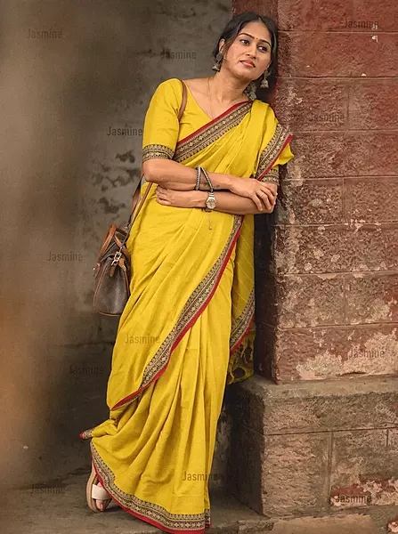 yellow Narayanpet cotton saree with plain body and red border