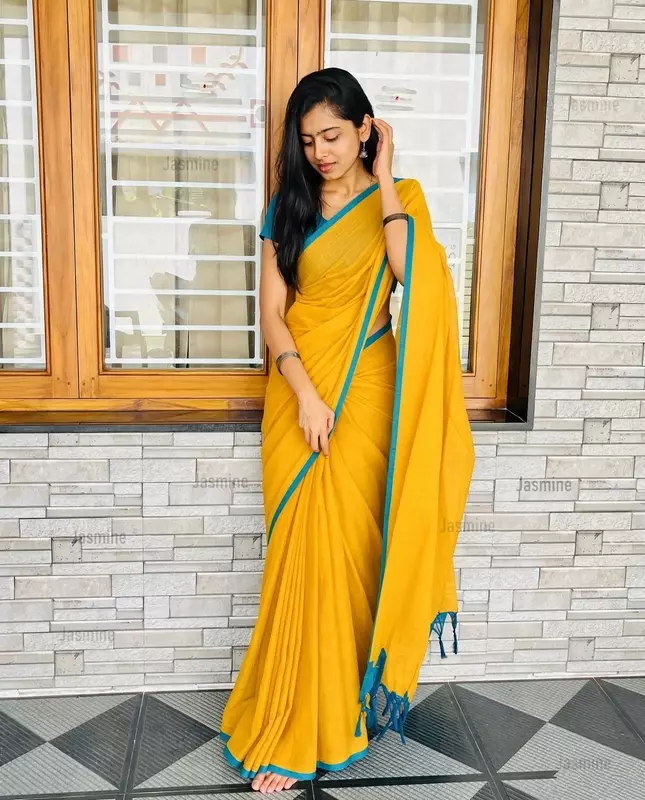 Yellow cotton saree with simple sky blue border