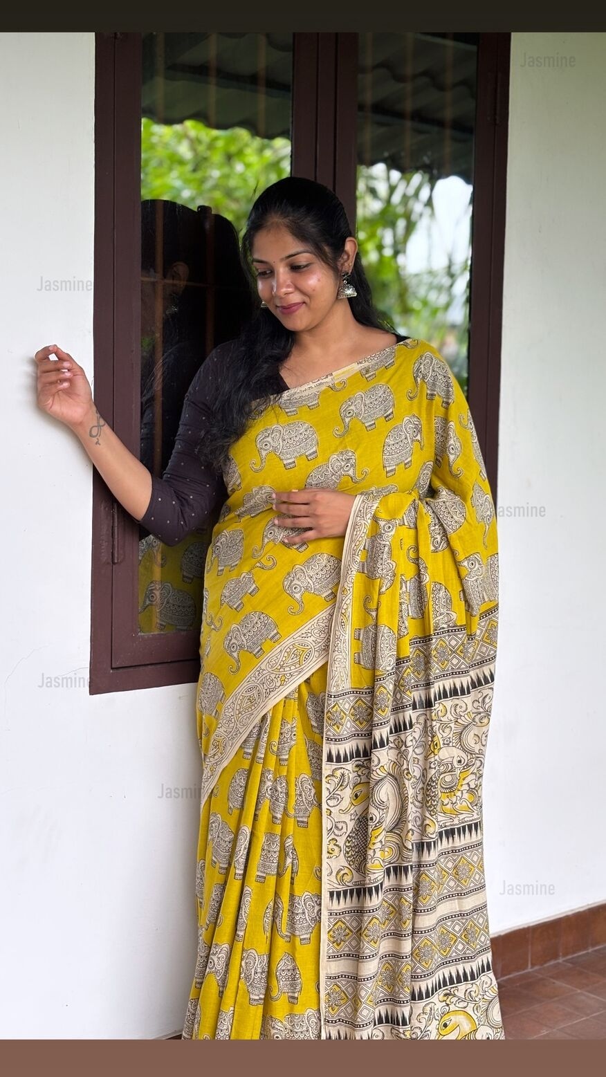 yellow Kalamkari saree with matching blouse piece and elephant motifs