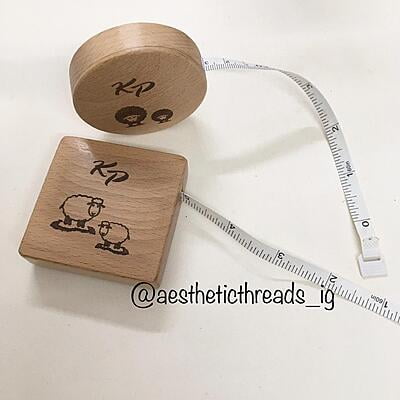 Wood encased measuring tape Wood encased measuring tape