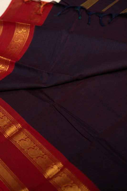 Kanchi Cotton plain body - Dark Purple with Broad Red Zari border on either side