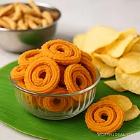 worth2deal Kerala Chakli placed on a banana leaf with other worth2deal snacks – Worth2Deal.com