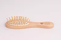 Bamboo paddle brush for smooth and tangle free kids hair