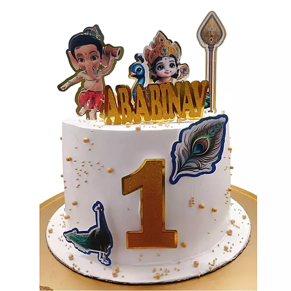 Lord Murugan themed first birthday cake