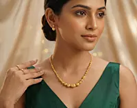 18 kt Golden Diamond-Cut Orb Necklace