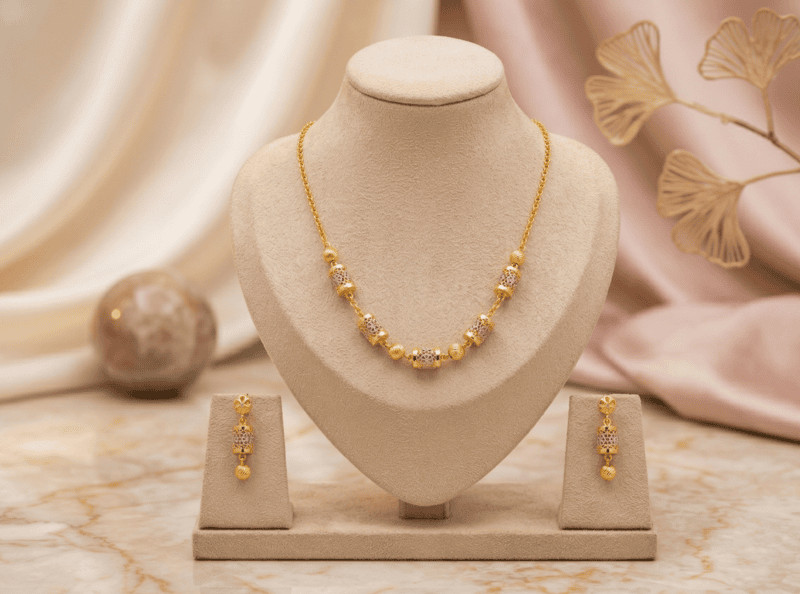 18 kt Gold Two-Tone Golden Barrel Necklace Set
