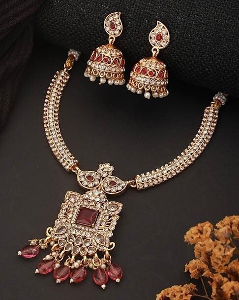 Traditional gold-tone necklace set with earrings