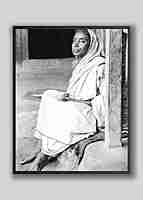 Holy Mother Sri Sarada Devi - Seated on Veranda at Jayrambati - Side View