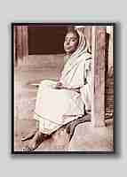 Holy Mother Sri Sarada Devi - Seated on Veranda at Jayrambati - Side View