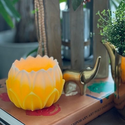 SHADED YELLOW HURRICANE LOTUS CANDLE