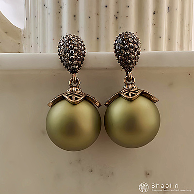 Exquisite Earring Featuring Large Spherical Pearl