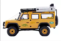 FMS Model 1: 10 FCX10 Land Rover Defender RS Yellow side profile in Camel Trophy Yellow finish