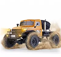 FMS Model 1: 10 Atlas 4x4 RS Orange front angle driving over rocks