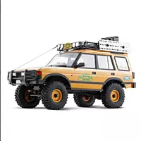 FMS Model 1:10 Land Rover Discovery RS Yellow side profile on trail